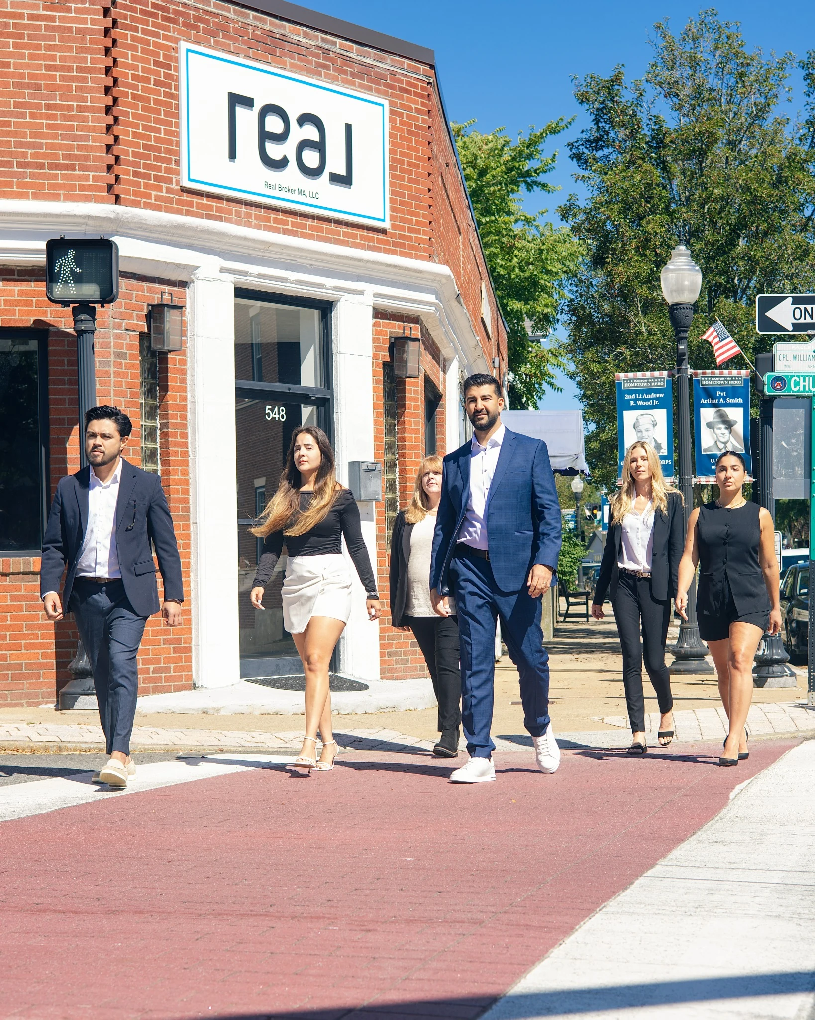 MAZ Living Group team outside the Real Broker office